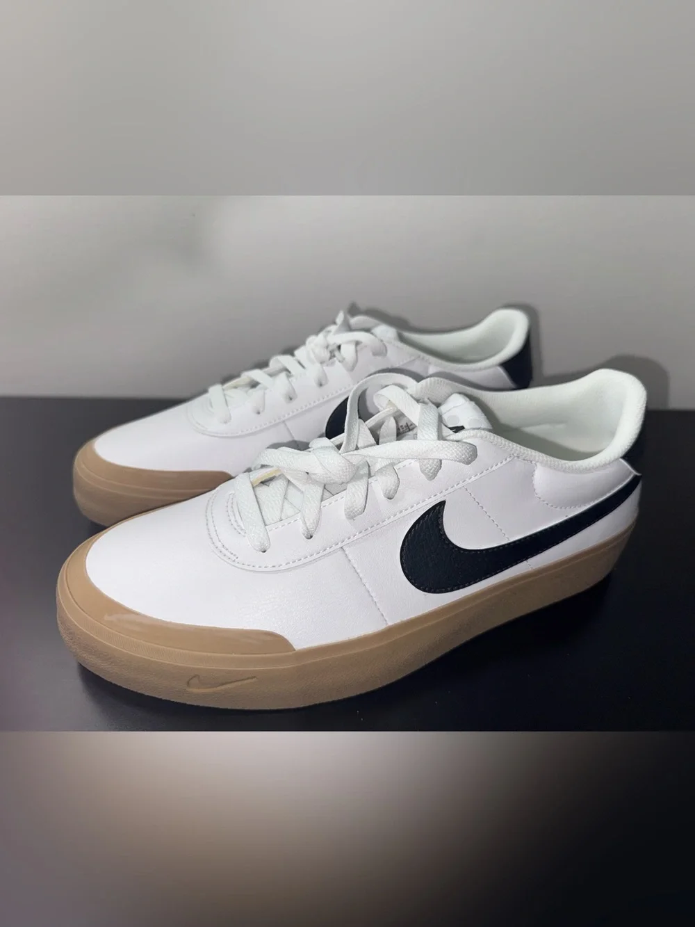 Nike Men’s White Sneakers with Black Swoosh and Gum Sole